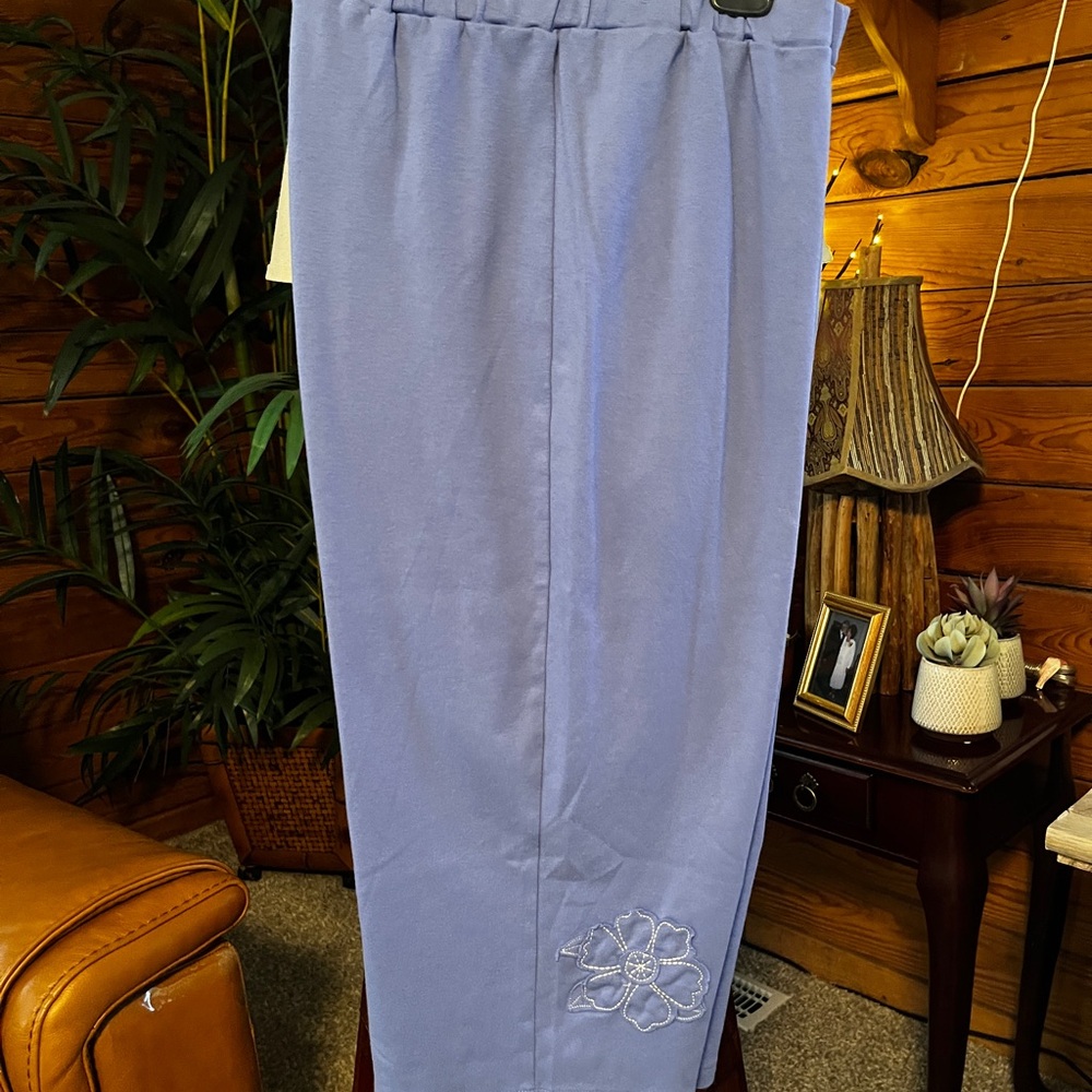 Only Necessities 2x(40”W x 54”H x 19”L)Blue Capris with Floral Appliqué.Knit.